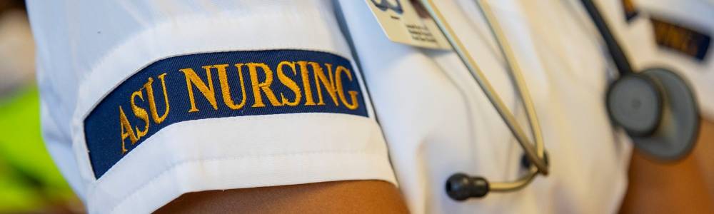 Image of nursing student's uniform with ASU Nursing armband