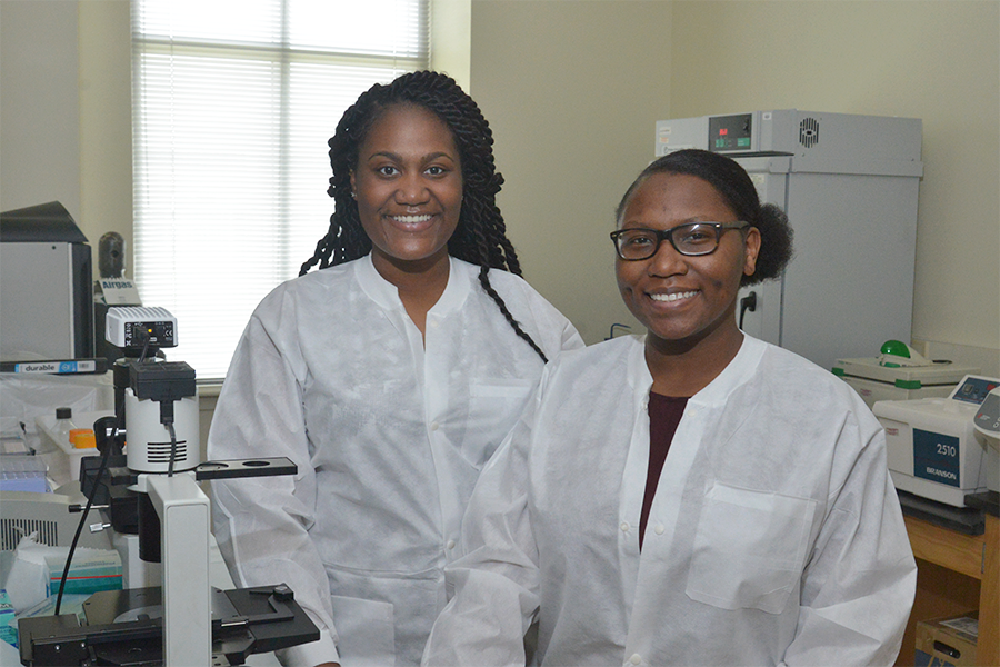Caption: Albany State University students DeStandreana Norwood (left) and Danielle Prier (right) will attend the 2018 Summer Biomedical Sciences Institute at Duke University to conduct health science research.
