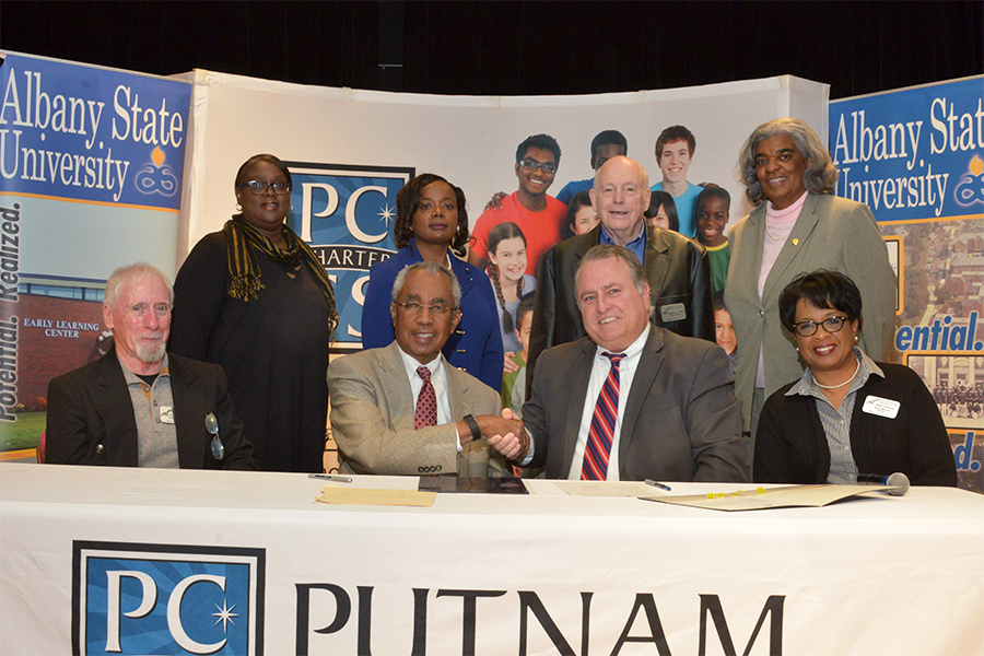 ASU and PCCSS partner to offer a summer bridge program to high school students. Back row (l to r): Rowena Daniels, Kimberly Holmes, Gene Smith and Avis Williams. Front row (l to r): Steve Weiner, Art Dunning, Eric Arena and Doris Clemens. Photo credit: Reginald Christian                                      