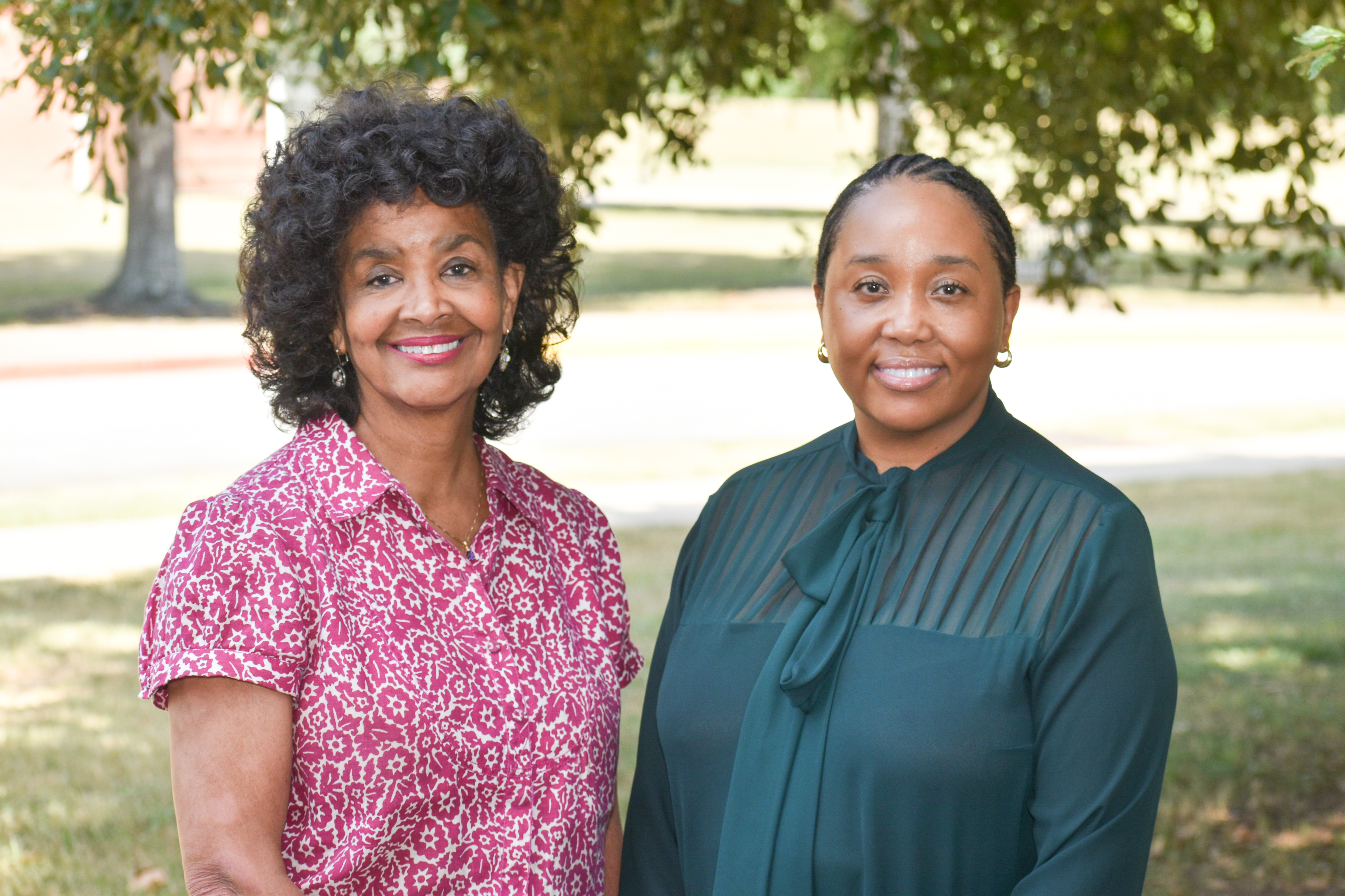 Dr. Lyons and Dr. Jones Smiling